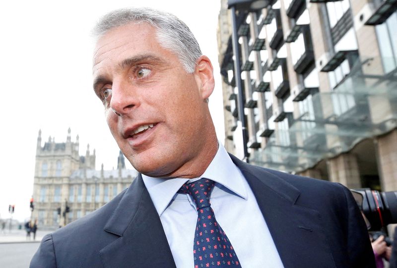 © Reuters. FILE PHOTO: Andrea Orcel, then a UBS chief executive, leaves after attending a UK parliamentary inquiry into Libor interest rates in London, January 9, 2013. REUTERS/Olivia Harris/File Photo