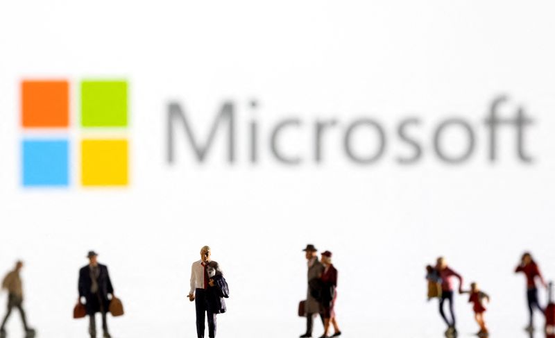 &copy; Reuters. FILE PHOTO: Small figurines are seen in front of displayed Microsoft logo in this illustration taken February 11, 2022. REUTERS/Dado Ruvic/Ilustration