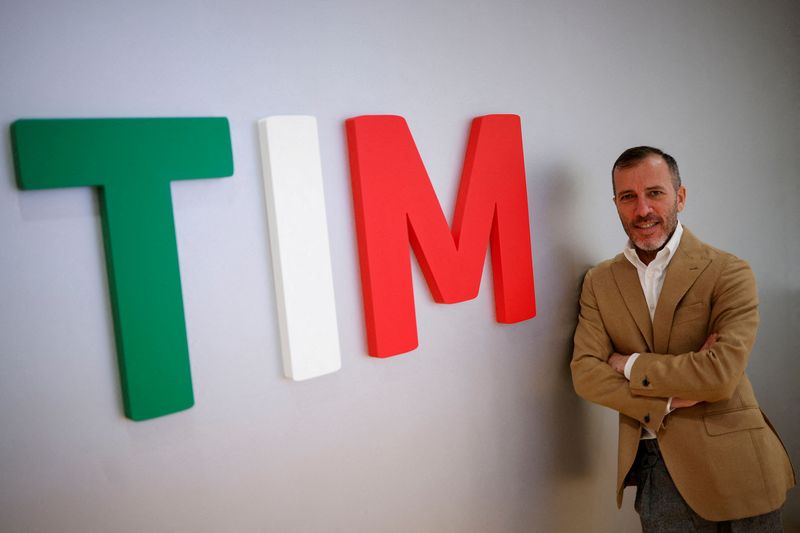 &copy; Reuters. FILE PHOTO: Telecom Italia (TIM) General Manager Pietro Labriola poses for a portrait next to the company's name at TIM headquarters in Rome, Italy, January 17, 2022. REUTERS/Guglielmo Mangiapane/