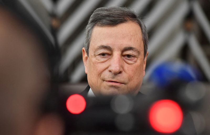 &copy; Reuters. FILE PHOTO: Italian Prime Minister Mario Draghi speaks with the media as he arrives for the EU-Africa summit at the European Council building in Brussels, Belgium February 17, 2022. Geert Vanden Wijngaert/Pool via REUTERS