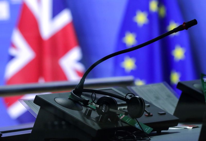 &copy; Reuters. Flags of the Union Jack and European Union are seen through interpreters booth ahead of the meeting of European Commission President Ursula von der Leyen and British Prime Minister Boris Johnson, in Brussels, Belgium December 9, 2020. Olivier Hoslet/Pool 