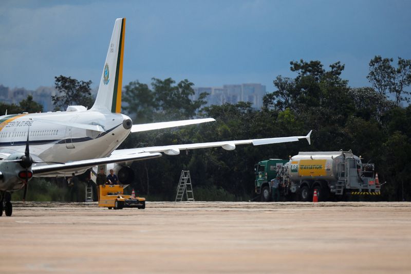 &copy; Reuters. A Petrobras fuel tank truck is seen next to the presidential air plane at the Brasilia Air Base in Brasilia, Brazil March 7, 2021. REUTERS/Adriano Machado