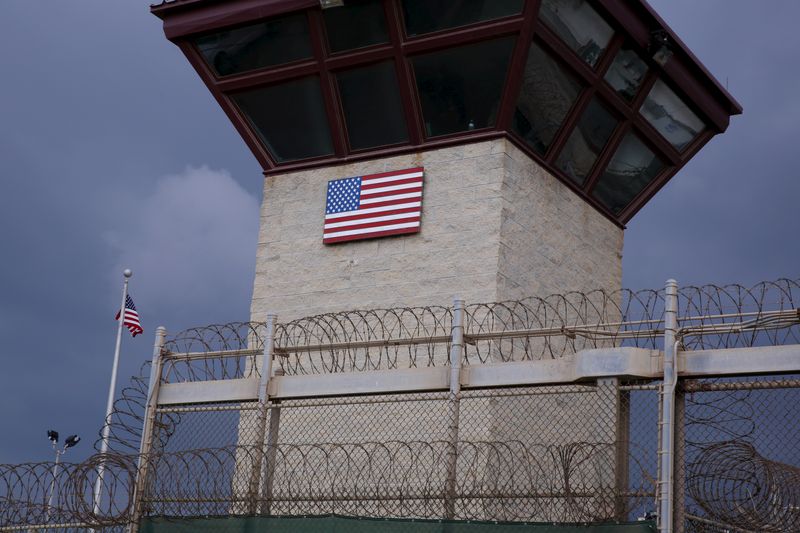 &copy; Reuters. FILE PHOTO: The United States flag decorates the side of a guard tower inside of Joint Task Force Guantanamo Camp VI at the U.S. Naval Base in Guantanamo Bay, Cuba March 22, 2016.  REUTERS/Lucas Jackson/File Photo