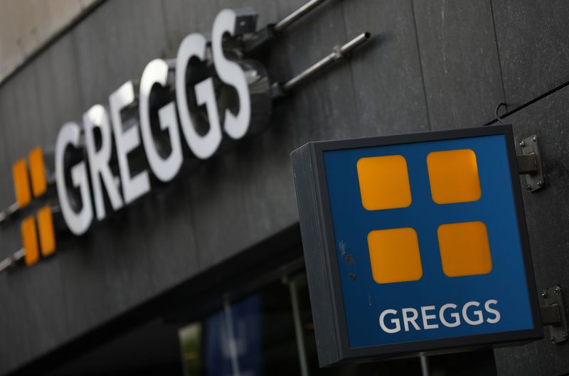 &copy; Reuters. FILE PHOTO: Signage and logo are pictured outside a branch of Greggs in Liverpool, Britain, July 30, 2019. REUTERS/Phil Noble