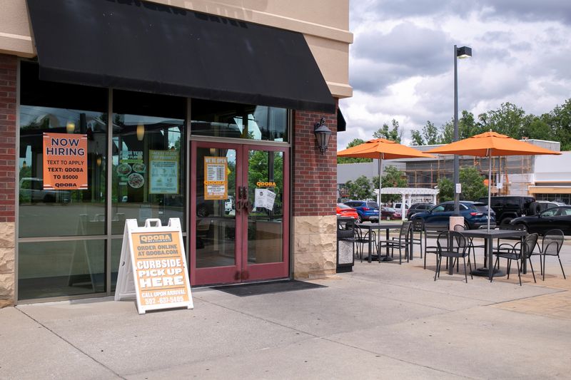 &copy; Reuters. FILE PHOTO: A hiring sign is seen in front of a Qdoba restaurant, as many restaurant businesses face staffing shortages in Louisville, Kentucky, U.S., June 7, 2021. Picture taken June 7, 2021.  REUTERS/Amira Karaoud