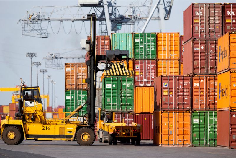 &copy; Reuters. FILE PHOTO: A shipping container is unloaded at the Port of Montreal in Montreal, Quebec, Canada, May 17, 2021.  REUTERS/Christinne Muschi