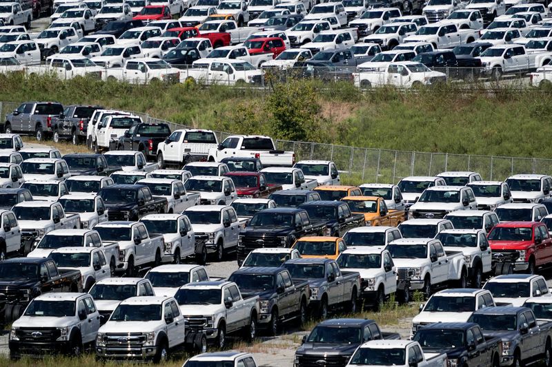 &copy; Reuters. Thousands of Ford F-150s without chips are stored at Kentucky Speedway in Sparta, Kentucky, U.S., September 8, 2021.  REUTERS/Jeff Dean
