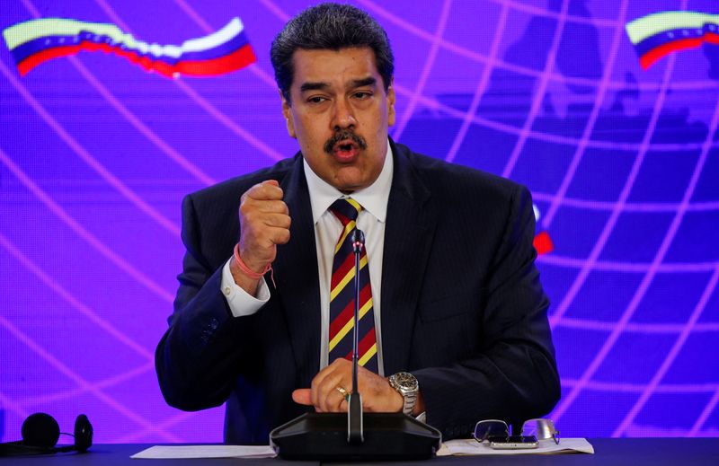 &copy; Reuters. FILE PHOTO: Venezuela's President Nicolas Maduro speaks beside Russian Deputy Prime Minister Yury Borisov (not pictured) after signing documents of a bilateral agreement at the Miraflores Palace during his visit to Caracas, Venezuela February 16, 2022. R