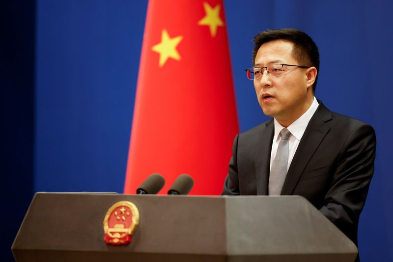 &copy; Reuters. المتحدث باسم وزارة الخارجية الصينية تشاو لي جيان في مؤتمر صحفي ببكين يوم 16 نوفمبر تشرين الثاني 2021. تصوير: كارلوس جارسيا راولينز - رويترز