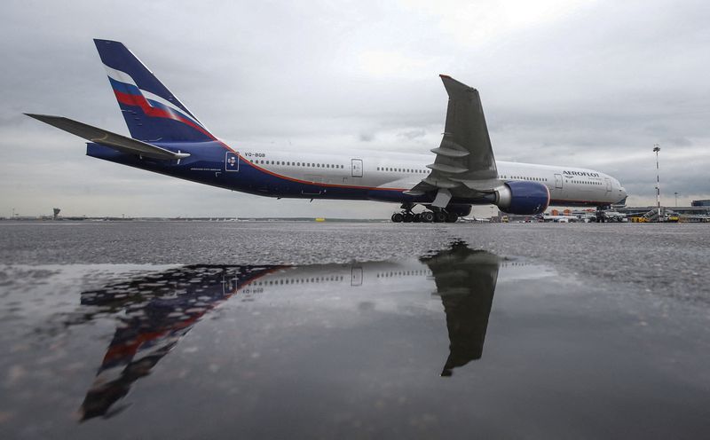 &copy; Reuters. FILE PHOTO: An Aeroflot Boeing 777-300ER aircraft is reflected in a puddle at Sheremetyevo International Airport outside Moscow, Russia, July 7, 2015. REUTERS/Maxim Shemetov