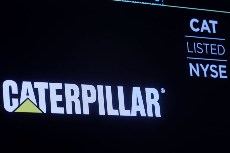 &copy; Reuters. FILE PHOTO: The company logo for Caterpillar Inc. is displayed on a screen at the New York Stock Exchange (NYSE) in New York, U.S., December 17, 2019. REUTERS/Brendan McDermid