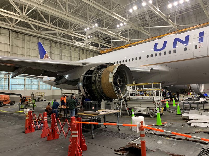 &copy; Reuters. The damaged starboard engine of United Airlines flight 328, a Boeing 777-200, is seen following a February 20 engine failure incident, in a hangar at Denver International Airport in Denver, Colorado, U.S. February 22, 2021. National Transportation Safety 