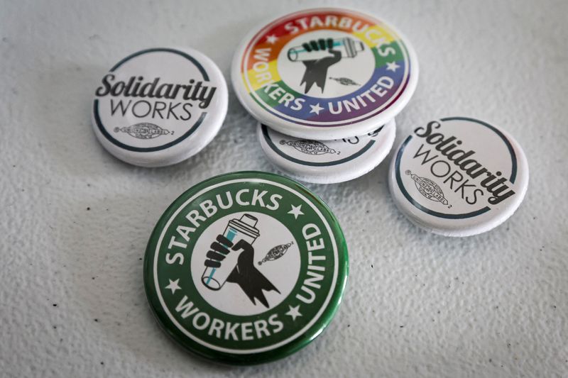 &copy; Reuters. FILE PHOTO: Buttons showing support for a Starbucks Union are seen at the Workers United, an affiliate of the Service Employees International Union, offices in Buffalo, New York, U.S., February 23, 2022.  REUTERS/Brendan McDermid