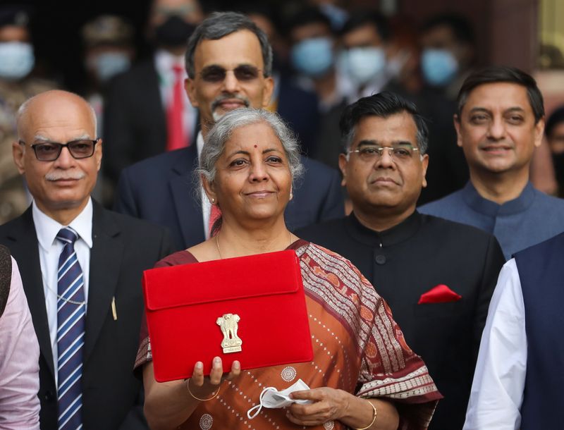 &copy; Reuters. FILE PHOTO - India's Finance Minister Nirmala Sitharaman holds up a folder with the Government of India’s logo as she leaves her office to present the federal budget in the parliament in New Delhi, India, February 1, 2022. REUTERS/Anushree Fadnavis