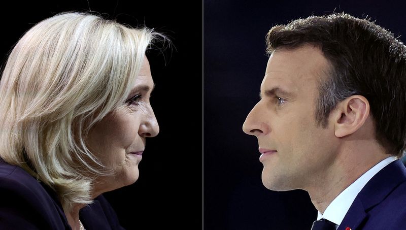&copy; Reuters. FILE PHOTO: A combination picture shows portraits of the two candidates running for the second round in the 2022 French presidential election, Marine Le Pen, French far-right National Rally (Rassemblement National) party candidate, and French President Em
