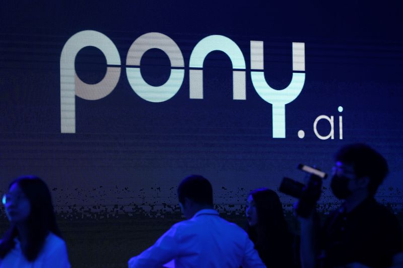 &copy; Reuters. FILE PHOTO: A logo of the autonomous driving technology startup Pony.ai is seen on a screen during an event in Beijing, China May 13, 2021. REUTERS/Tingshu Wang