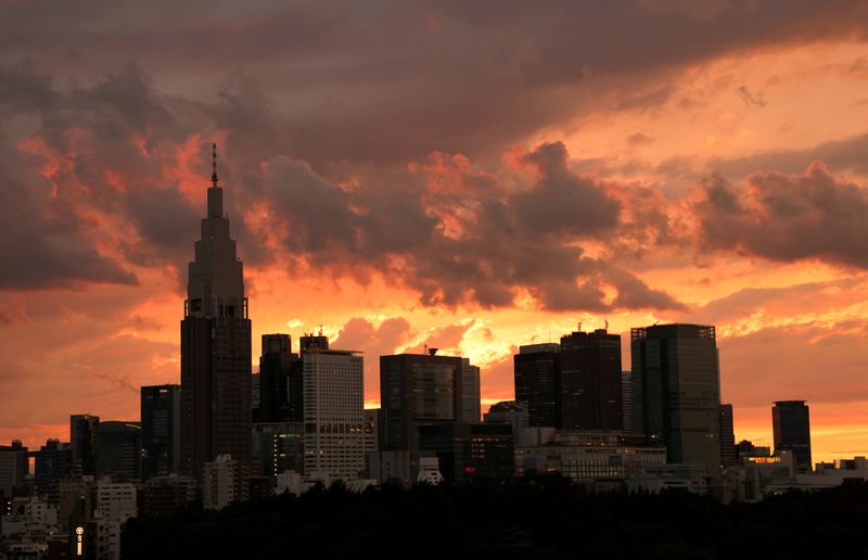 &copy; Reuters. FILE PHOTO: A view of the skyline and buildings at Shinjuku district during sunset in Tokyo, Japan June 20, 2021. REUTERS/Pawel Kopczynski