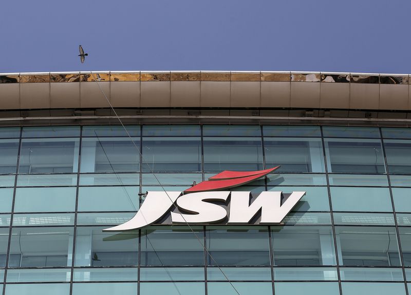 &copy; Reuters. FILE PHOTO: The logo of JSW is seen on the company's headquarters in Mumbai, India, February 11, 2016. Indian conglomerate JSW Group, whose businesses range from power to steel and cement, is looking to buy debt-laden port assets in the country as part of