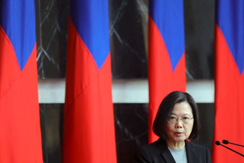 &copy; Reuters. FILE PHOTO: Taiwan President Tsai Ing-wen speaks at a rank conferral ceremony for military officials from the Army, Navy and Air Force, at the defence ministry in Taipei, Taiwan December 28, 2021. REUTERS/Annabelle Chih