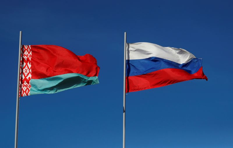 &copy; Reuters. FILE PHOTO: Belarusian and Russian national flags are seen at the construction site of the very first Belarusian nuclear power plant, which will have two power-generating units, near the town of Ostrovets, Belarus October 10, 2018. REUTERS/Vasily Fedosenk