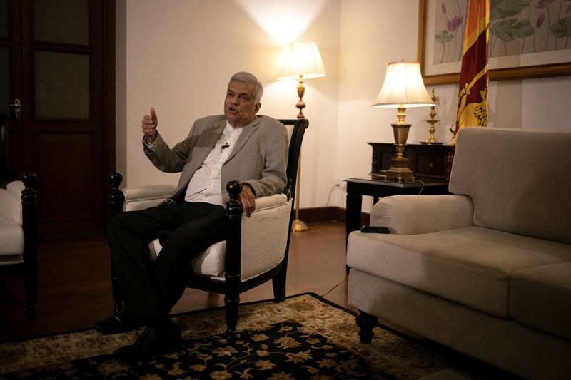 &copy; Reuters. FILE PHOTO: Sri Lanka's Prime Minister Ranil Wickremesinghe gestures as he speaks during an interview with Reuters at his office in Colombo, Sri Lanka, May 24, 2022. REUTERS/Adnan Abidi