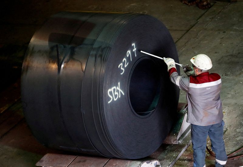 &copy; Reuters. FILE PHOTO: A steel coil receives its number by a worker at the ThyssenKrupp steel plant in Duisburg, Germany January 30, 2020. REUTERS/Wolfgang Rattay/File Photo