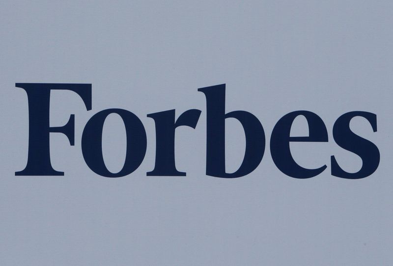 &copy; Reuters. FILE PHOTO: The logo of Forbes magazine is seen on a board at the St. Petersburg International Economic Forum 2017 (SPIEF 2017) in St. Petersburg, Russia, June 1, 2017. REUTERS/Sergei Karpukhin