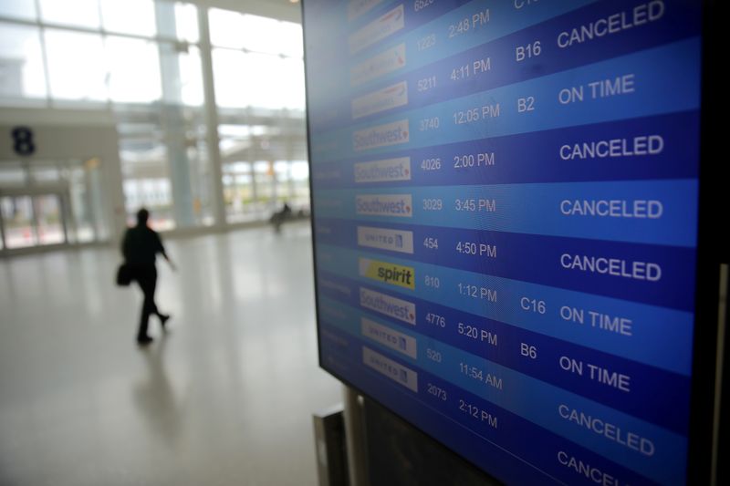 &copy; Reuters. FILE PHOTO: Canceled flights are seen on an airport screen in New Orleans, Louisiana U.S., April 4, 2020. REUTERS/Carlos Barria/File Photo