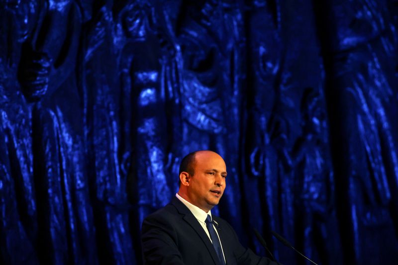 &copy; Reuters. FILE PHOTO: Israeli Prime Minister Naftali Bennett speaks at the Holocaust Martyrs' and Heroes Remembrance Day opening ceremony in memory of the six million Jewish men, women and children murdered by the Nazis and their collaborators, at Yad Vashem Holoca