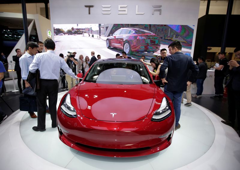 &copy; Reuters. FILE PHOTO: A Tesla Model 3 car is displayed during a media preview at the Auto China 2018 motor show in Beijing, China April 25, 2018. REUTERS/Jason Lee