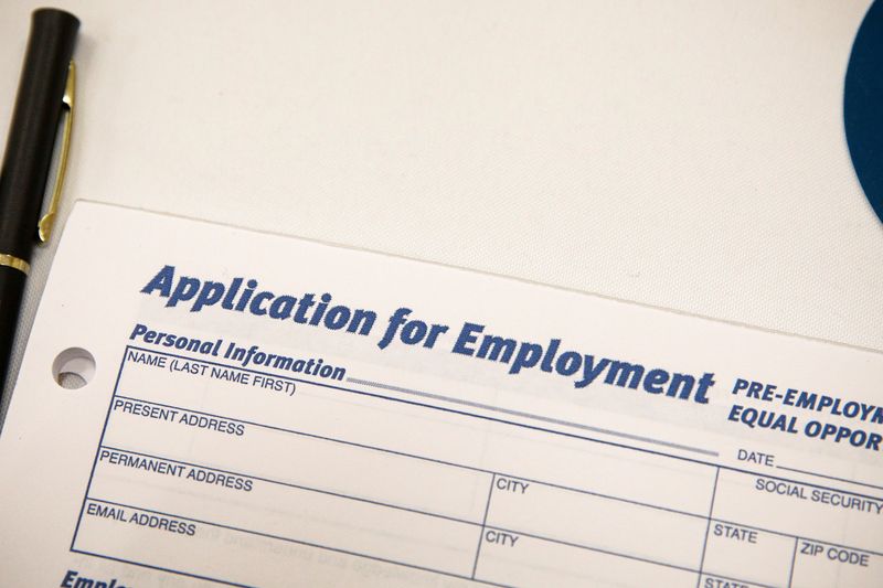 &copy; Reuters. FILE PHOTO: An employment application form is displayed during a restaurant job career fair organized by the industry group High Road Restaurants in New York City, U.S., May 13, 2021.  REUTERS/Brendan McDermid