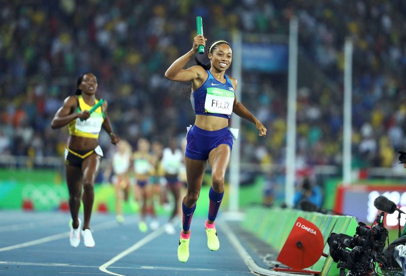 &copy; Reuters. FILE PHOTO: 2016 Rio Olympics - Athletics - Final - Women's 4 x 400m Relay Final - Olympic Stadium - Rio de Janeiro, Brazil - 20/08/2016. Allyson Felix (USA) of USA celebrates as team USA win the gold. This win is Felix's sixth gold in track and field. RE