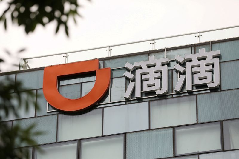 &copy; Reuters. FILE PHOTO: A sign of Chinese ride-hailing service Didi is seen on its headquarters in Beijing, China July 5, 2021. REUTERS/Tingshu Wang/File Photo