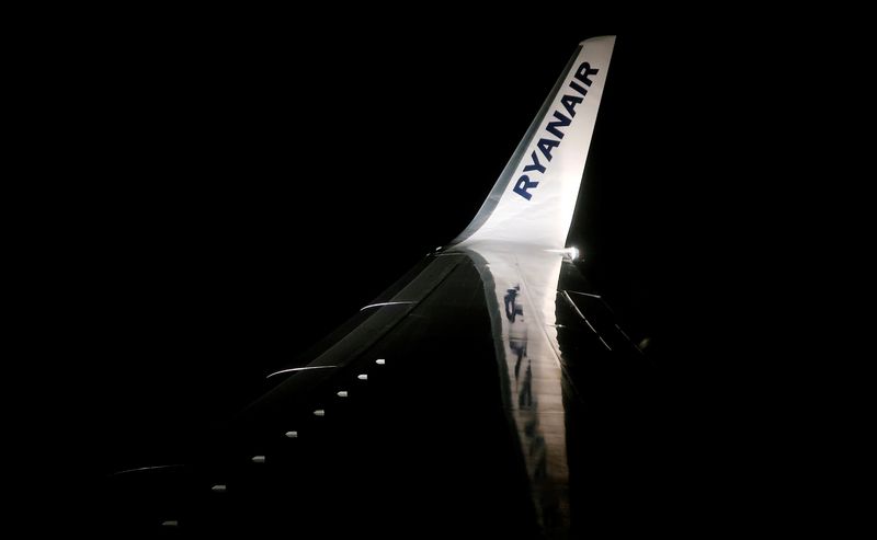 &copy; Reuters. FILE PHOTO: A Ryanair logo is seen on a wing of a passenger aircraft travelling from Madrid International Airport to Bergamo Airport, Italy, January 14, 2018. Picture taken January 14, 2018. REUTERS/Stefano Rellandini