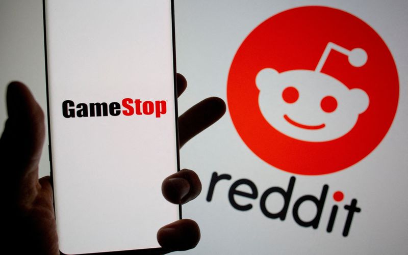 &copy; Reuters. FILE PHOTO: GameStop logo is seen in front of displayed Reddit logo in this illustration taken on Febr. 2, 2021. REUTERS/Dado Ruvic/Illustration//File Photo