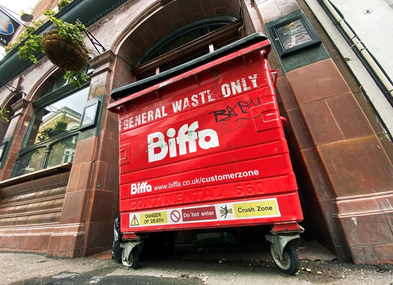 &copy; Reuters. FILE PHOTO: The logo of waste management company Biffa is seen on a large wheelie bin outside a pub, following the outbreak of the coronavirus disease (COVID-19), in London, Britain, June 5, 2020.   REUTERS/Simon Newman