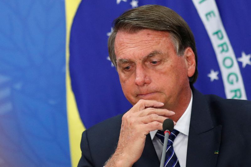 &copy; Reuters. FILE PHOTO: Brazil's President Jair Bolsonaro gestures as he attends a news conference at the Planalto Palace in Brasilia, Brazil June 6, 2022. REUTERS/Adriano Machado