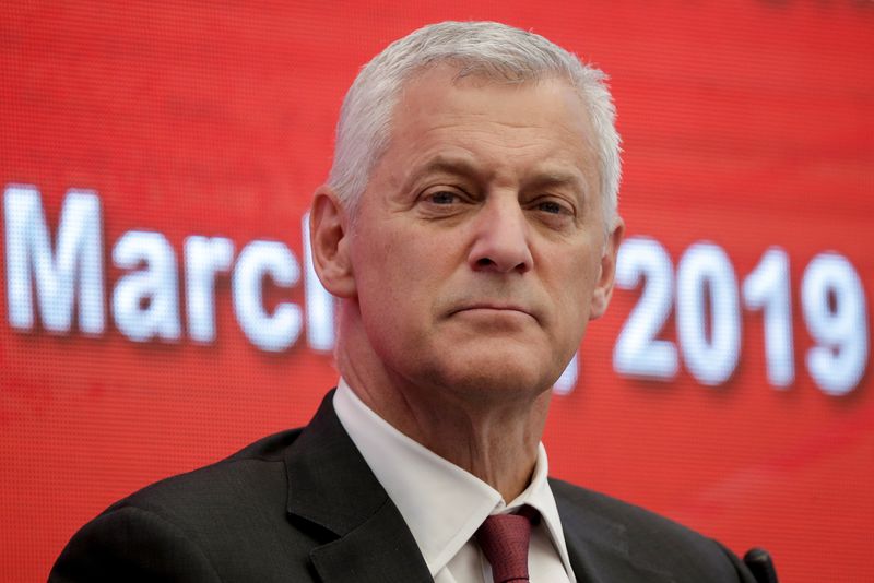 &copy; Reuters. FILE PHOTO: Standard Chartered PLC Group Chief Executive Bill Winters attends the China Development Forum in Beijing, China March 23, 2019. REUTERS/Thomas Peter