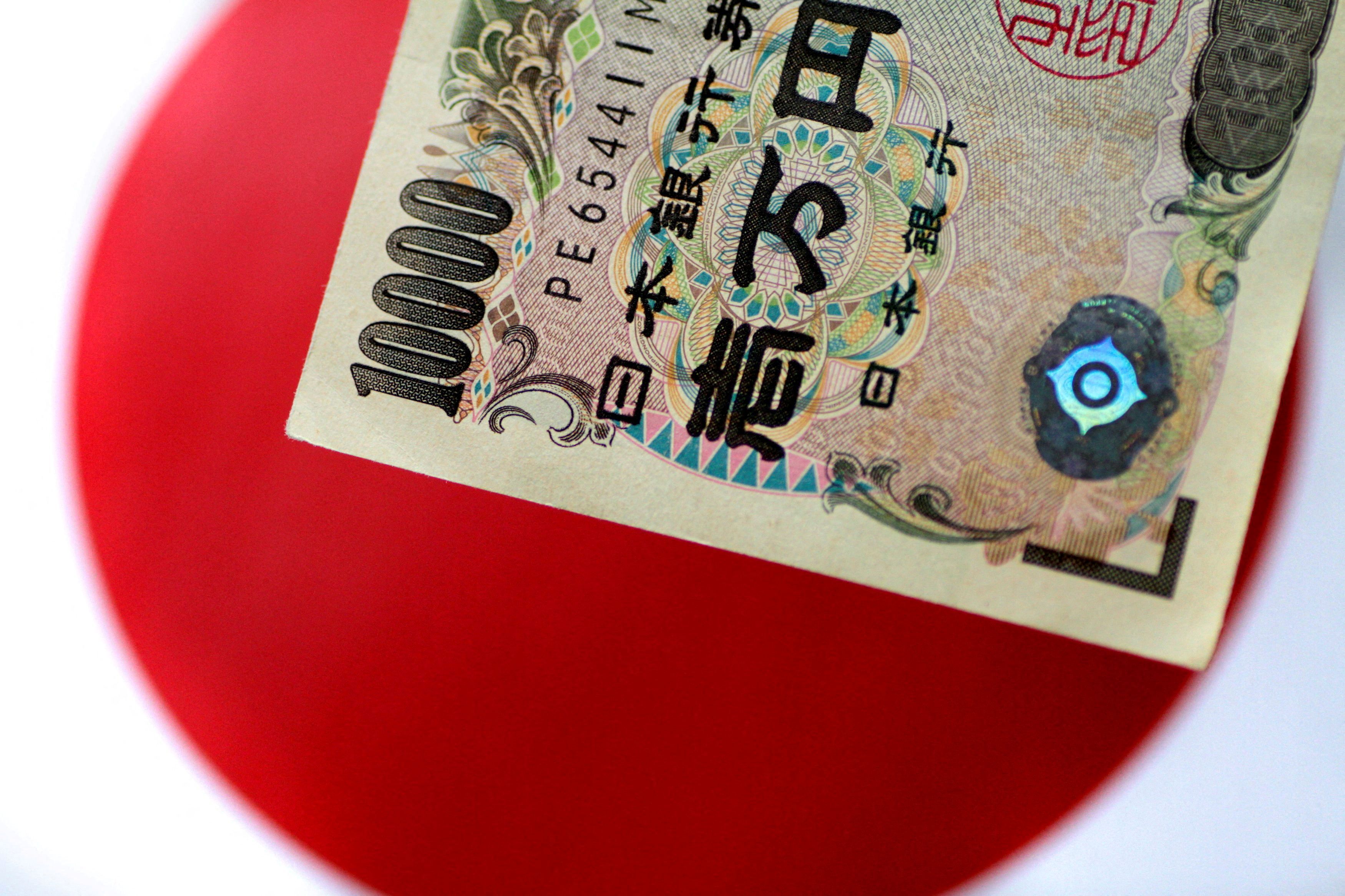 Explainer-What are the consequences of the yen's fall to a 24-year low?
