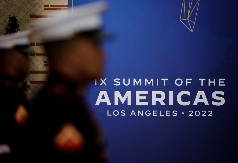 © Reuters. FILE PHOTO: Members of the military stand next to a sign of the ninth Summit of the Americas, at a dinner in Malibu, near Los Angeles, California, U.S. June 9, 2022. REUTERS/Daniel Becerril/File Photo