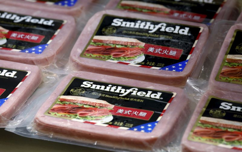 &copy; Reuters. FILE PHOTO: Products of Smithfield, acquired by WH Group, the largest pork company in the world, are displayed at a news conference on the company's annual results in Hong Kong, China March 29, 2016.      REUTERS/Bobby Yip