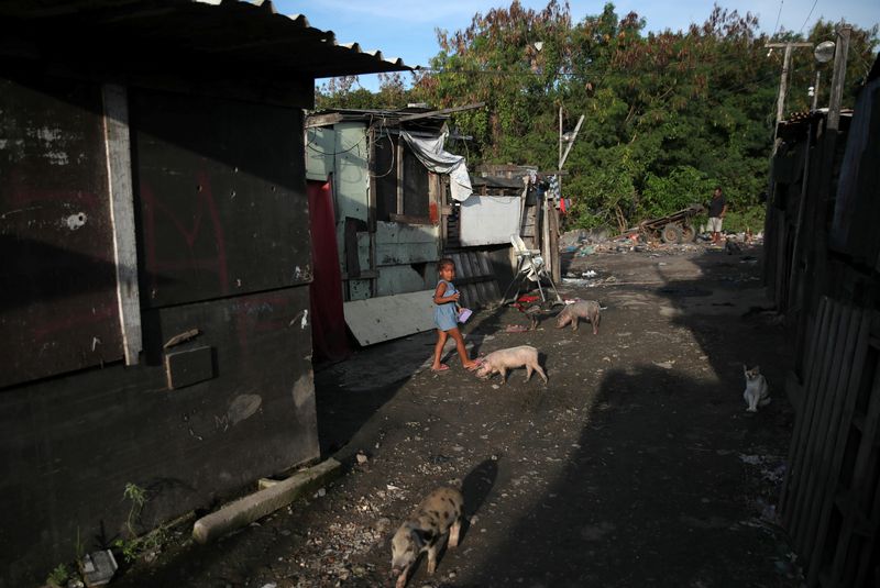 &copy; Reuters. Criança moradora da Cidade de Deus, no Rio de Janeiro
24/06/2021
REUTERS/Ricardo Moraes