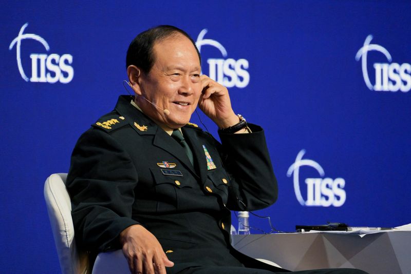 © Reuters. China's State Councilor and Defence Minister General Wei Fenghe answers questions from the audience at a plenary session during the 19th Shangri-La Dialogue in Singapore June 12, 2022. REUTERS/Caroline Chia