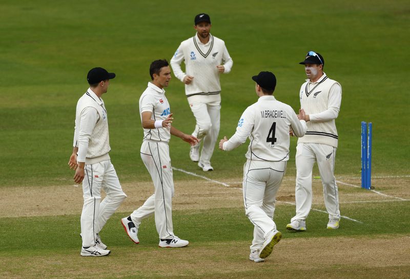 &copy; Reuters. Cricket - Second Test - England v New Zealand - Trent Bridge, Nottingham, Britain - June 13, 2022 New Zealand's Trent Boult celebrates with teammates after taking the wicket of England's Matthew Potts Action Images via Reuters/Andrew Boyers
