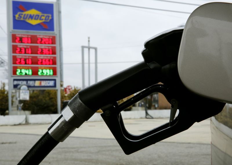 &copy; Reuters. A Sunoco station with current gasoline and diesel prices is seen during a fill up in Colesville, Maryland February 10, 2015. 
