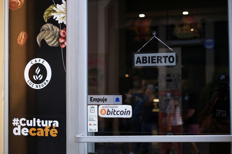 &copy; Reuters. FILE PHOTO: A sign reads "Bitcoin accepted here" outside a coffee shop where the cryptocurrency is accepted as a payment method in San Salvador, El Salvador May 15, 2022. REUTERS/Jose Cabezas