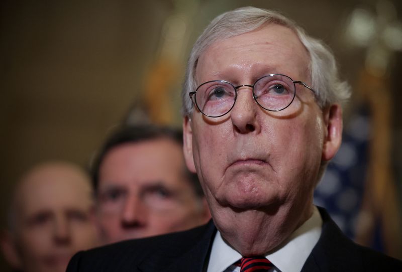 &copy; Reuters. FILE PHOTO: Senate Minority Leader Mitch McConnell (R-KY) speaks at the weekly Republican news conference at the United States Capitol building flanked by Senators Rick Scott (R-FL) and John Barrasso (R-WY) in Washington, U.S., May 24, 2022. REUTERS/Evely