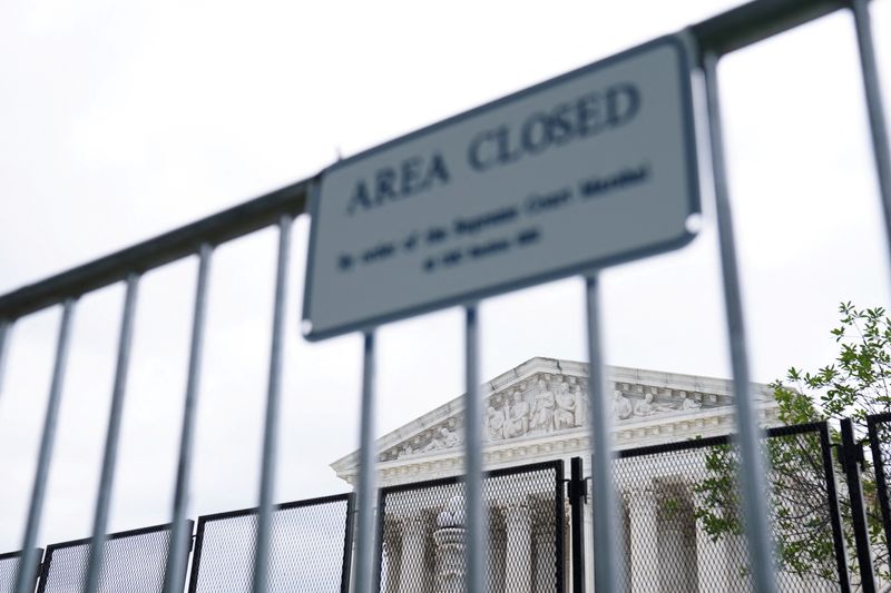 &copy; Reuters. FILE PHOTO: Security fencing is seen outside the U.S. Supreme Court in Washington, D.C., U.S., June 14, 2022. REUTERS/Sarah Silbiger