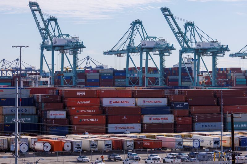 &copy; Reuters. FILE PHOTO: Stacked containers and cranes are shown at the Port of Los Angeles in Los Angeles, California, U.S. November 22, 2021. REUTERS/Mike Blake