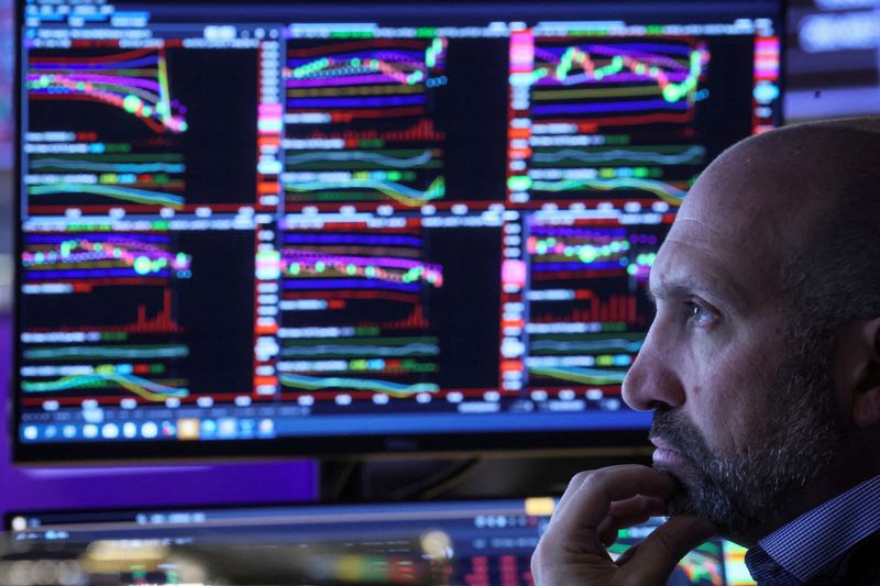 &copy; Reuters. A trader works on the floor of the New York Stock Exchange (NYSE) in New York City, U.S. June 14, 2022. REUTERS/Brendan McDermid      TPX IMAGES OF THE DAY